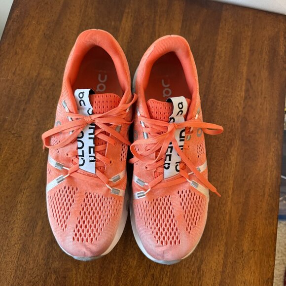 On Running Men’s Athletic Shoes in Coral and White